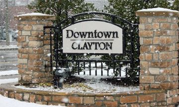 Snowy Downtown Clayton Sign